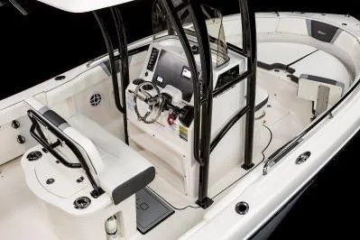 Slide: The Image of 2026 Robalo R222 Center Console boat interior with modern helm and seating. - 10