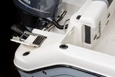 Slide: The Image of 2026 Robalo R222 Center Console boat with Yamaha engine, featuring sleek design and modern amenities. - 12