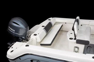 Slide: The Image of 2026 Robalo R222 Center Console boat with Yamaha engine, featuring sleek seating and modern design. - 13
