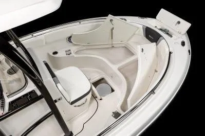 Slide: The Image of 2026 Robalo R222 Center Console boat interior with seating and storage compartments. - 7
