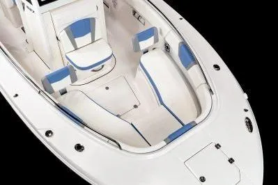 Slide: The Image of 2026 Robalo R270 Center Console boat interior with white and blue seating. - 6
