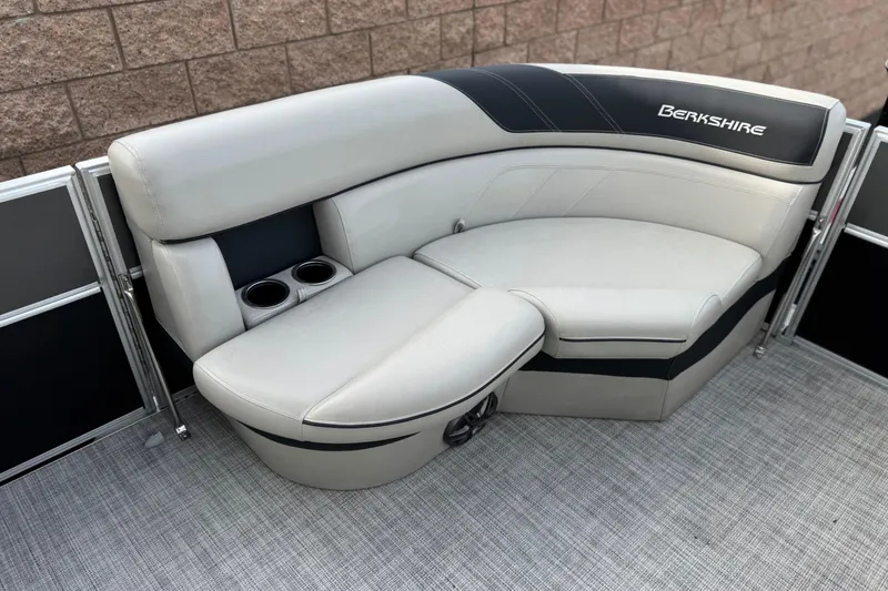 Slide: The Image of Luxurious seating on 2023 Berkshire 22RFX LE pontoon boat with cup holders. - 11