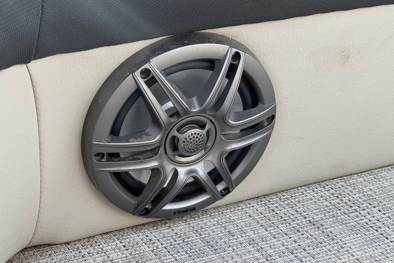 Slide: The Image of 2023 Berkshire 22RFX LE boat speaker on beige upholstery. - 19