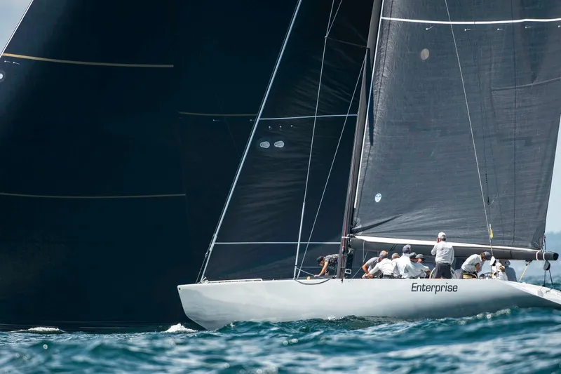 Slide: The Image of Sailing yacht "Enterprise" by Sparkman & Stephens, 12M model, 1997, racing on open water. - 2