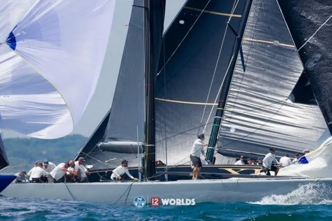 Slide: The Image of Sailing yacht Sparkman & Stephens 12M, 1997, competing in a regatta. - 6