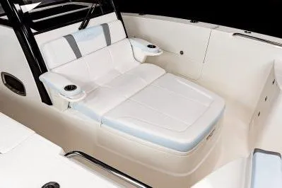 Slide: The Image of 2026 Robalo R360 Center Console boat with luxurious seating and cup holders. - 10