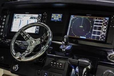 Slide: The Image of 2026 Robalo R360 Center Console dashboard with advanced navigation displays and controls. - 14