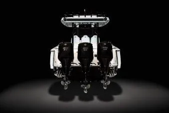 Slide: The Image of 2026 Robalo R360 Center Console boat with triple outboard engines, rear view. - 21