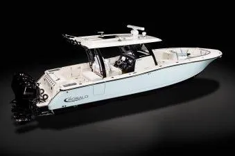 Slide: The Image of 2026 Robalo R360 Center Console boat, sleek design, white hull, powerful engines. - 6