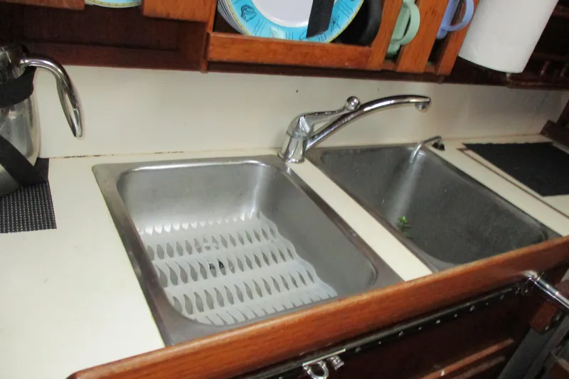 Slide: The Image of 1977 Valiant 40 yacht kitchen sink with dual basins and faucet. - 20