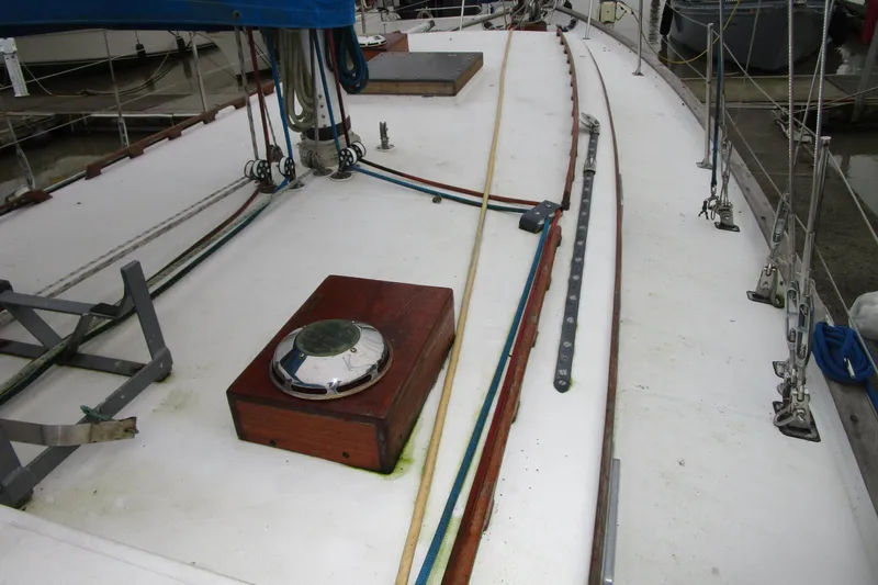 Slide: The Image of Deck of a 1977 Valiant 40 sailboat with rigging and hatch details. - 6