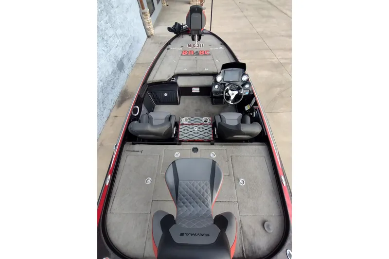 Slide: The Image of 2016 Nitro Z21 boat interior with steering console and seating. - 5