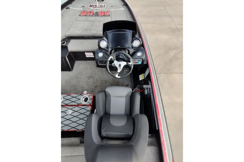 Slide: The Image of 2016 Nitro Z21 boat cockpit with steering wheel and dashboard controls. - 6