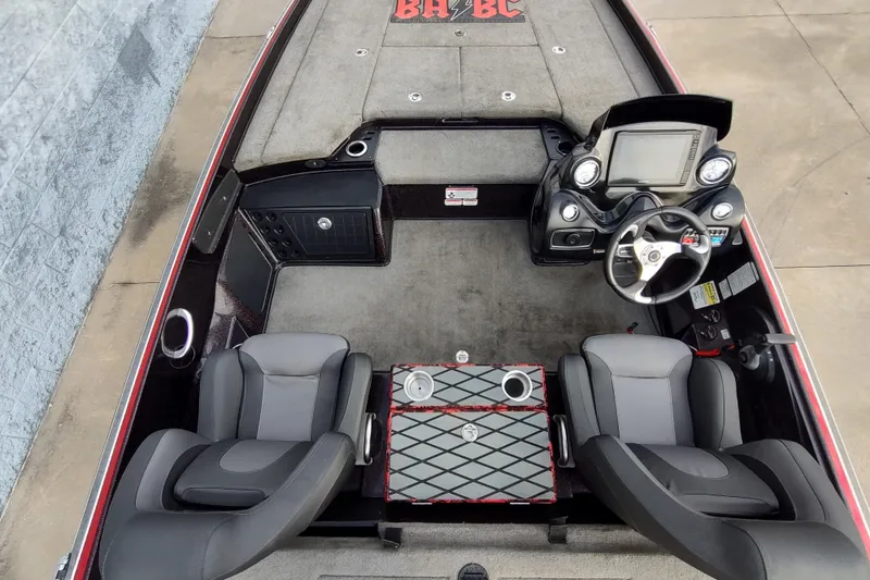 Slide: The Image of 2016 Nitro Z21 boat interior with dual seats and steering console. - 7