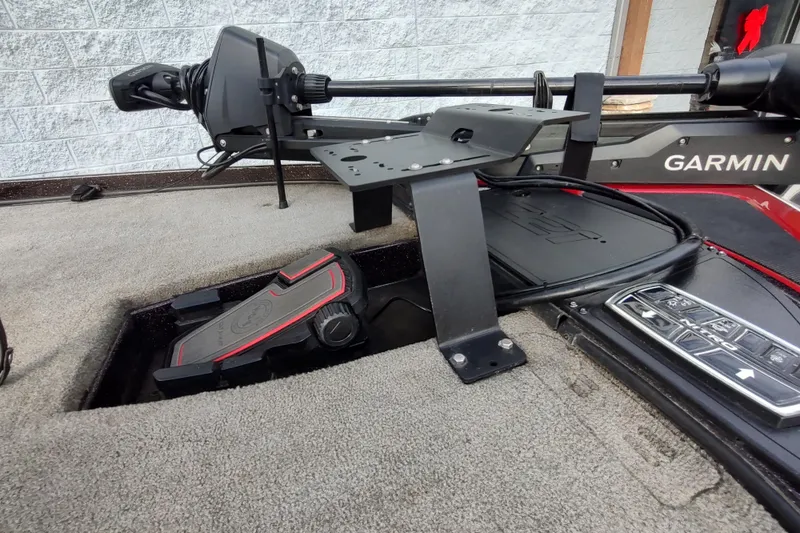 Slide: The Image of 2016 Nitro Z21 boat deck with Garmin trolling motor and foot pedal controls. - 9