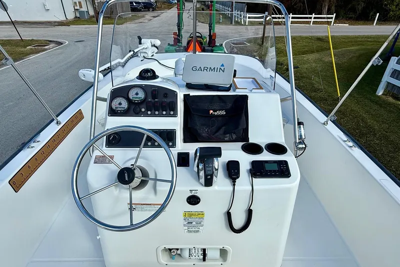 Slide: The Image of 2017 Boston Whaler 210 Montauk boat dashboard with Garmin navigation system. - 10