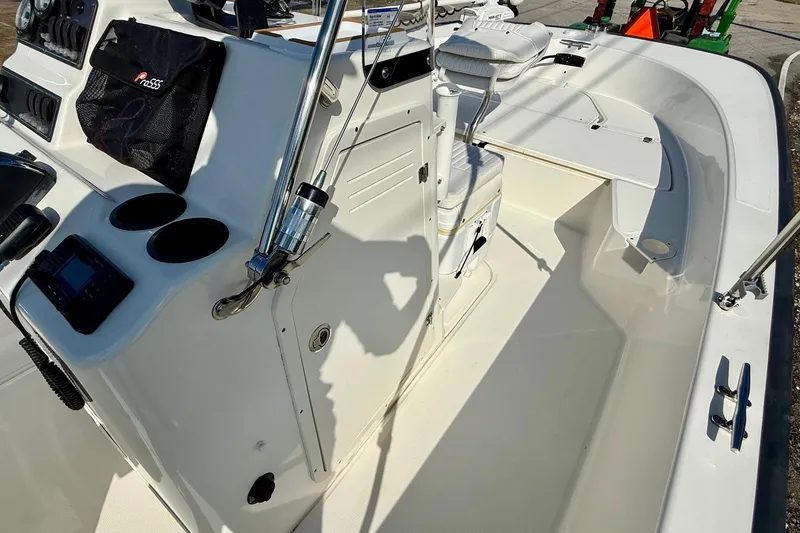 Slide: The Image of 2017 Boston Whaler 210 Montauk boat interior with seating and control panel. - 13