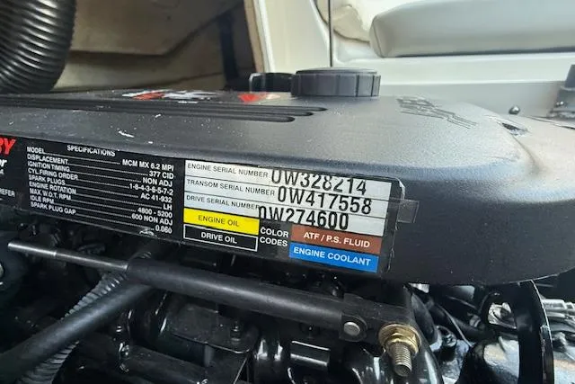 Slide: The Image of Engine compartment of a 2005 Sea Ray 220 Sundeck with serial numbers and specifications visible. - 29