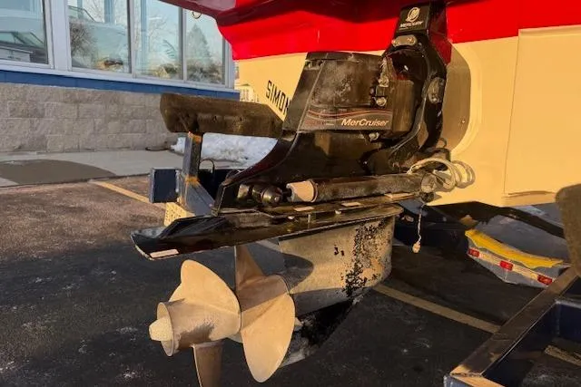 Slide: The Image of 2005 Sea Ray 220 Sundeck with MerCruiser engine, close-up of propeller and stern drive. - 34