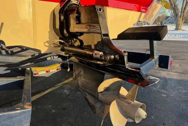 Slide: The Image of Rear view of a 2005 Sea Ray 220 Sundeck boat with MerCruiser outdrive. - 35