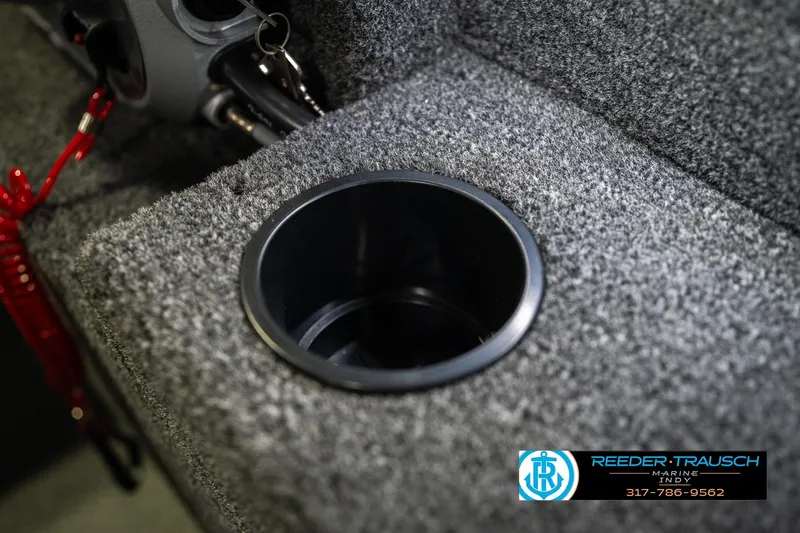 Slide: The Image of Cup holder in 2026 Lund 1675 Adventure SS boat, featuring carpeted interior. - 40