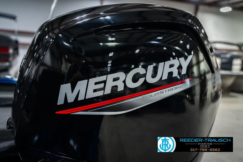 Slide: The Image of Mercury FourStroke engine on 2026 Lund 1675 Adventure SS boat, indoor showroom. - 43
