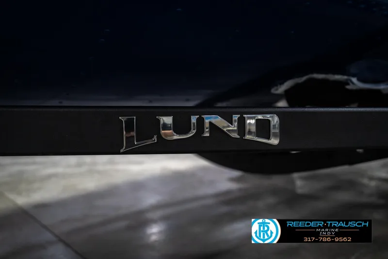 Slide: The Image of 2026 Lund 1675 Adventure SS boat logo with Reeder-Trausch Marine contact details. - 51
