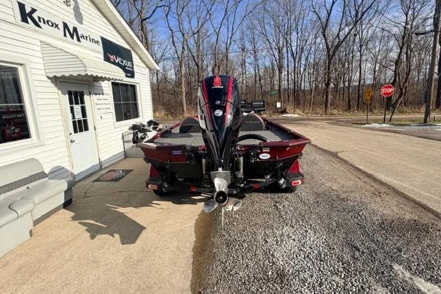 Slide: The Image of 2022 Vexus AVX1980 boat parked outside Knox Marine dealership on a sunny day. - 4