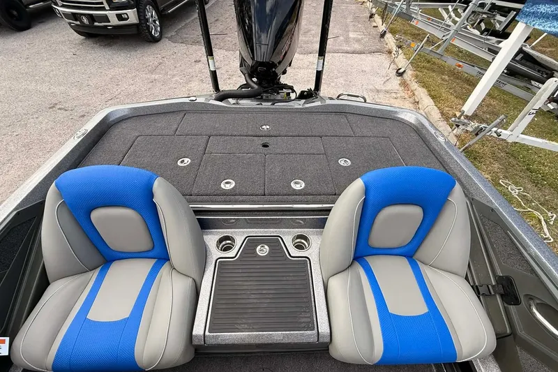 Slide: The Image of Interior of 2026 Ranger Z518 boat with blue seats. - 5