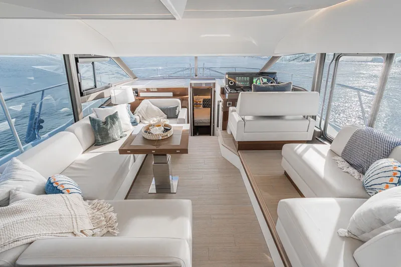 Slide: The Image of Luxurious interior of 2023 Prestige 520 yacht with elegant seating and ocean view. - 44