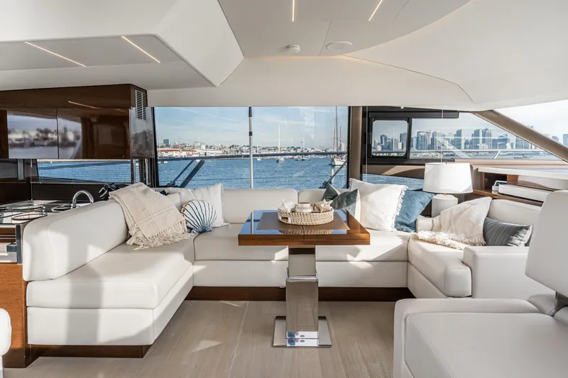Slide: The Image of Luxurious 2023 Prestige 520 yacht interior with elegant seating and ocean view. - 45