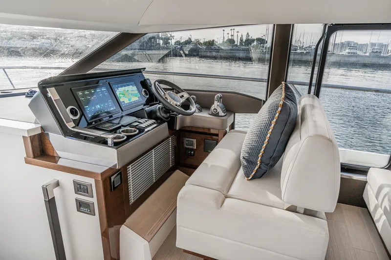 Slide: The Image of Luxurious helm of 2023 Prestige 520 yacht with modern navigation systems. - 47
