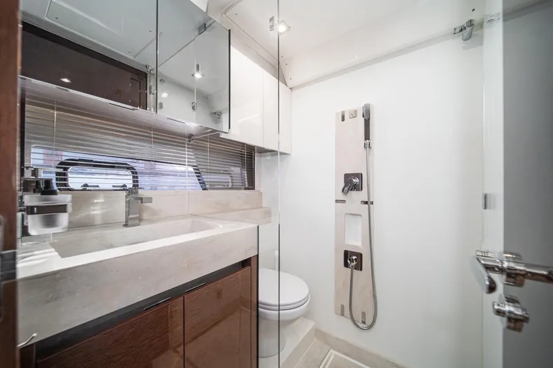 Slide: The Image of Luxurious bathroom in 2023 Prestige 520 yacht with modern fixtures and elegant design. - 52