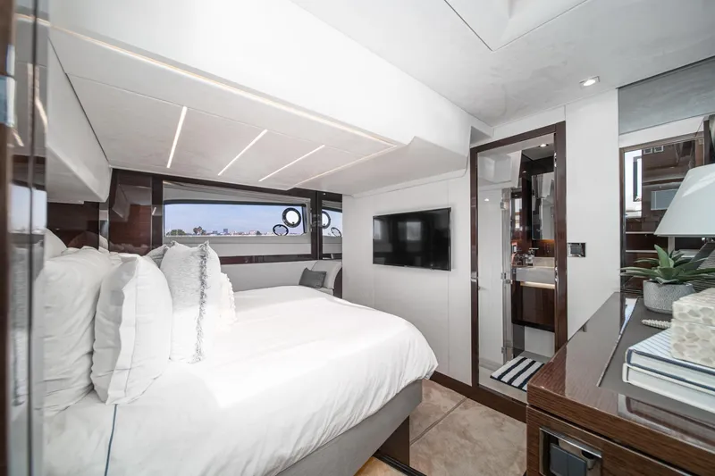 Slide: The Image of Luxurious bedroom interior of 2023 Prestige 520 yacht with modern design and amenities. - 54