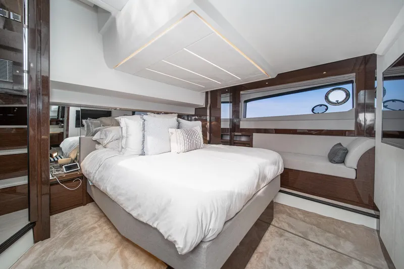 Slide: The Image of Luxurious bedroom interior of 2023 Prestige 520 yacht with modern design and elegant furnishings. - 55