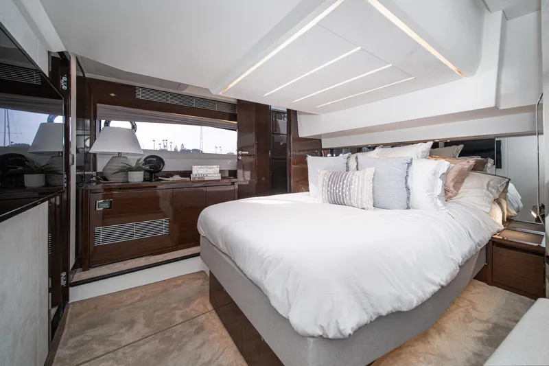 Slide: The Image of Luxurious bedroom interior of 2023 Prestige 520 yacht with elegant decor and modern design. - 56
