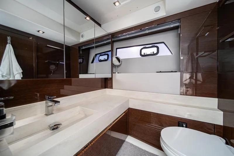Slide: The Image of Luxurious bathroom in 2023 Prestige 520 yacht with modern fixtures and elegant design. - 57