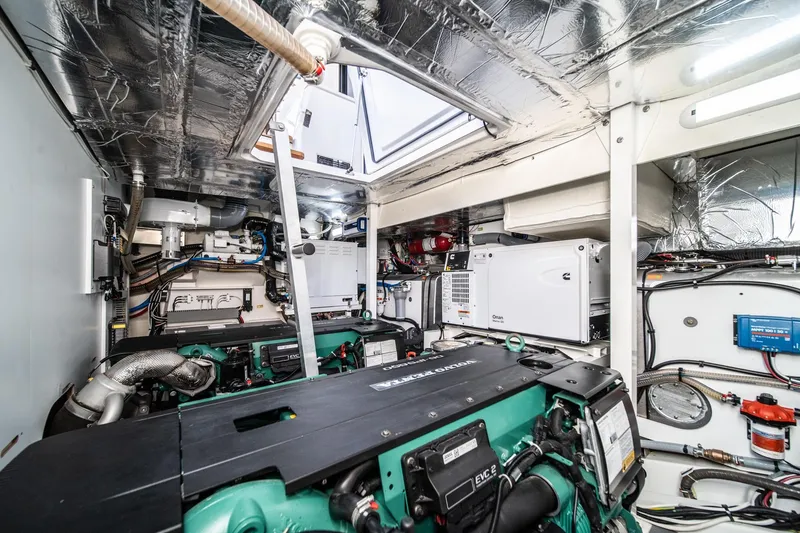 Slide: The Image of Engine room of 2023 Prestige 520 yacht with advanced machinery and equipment. - 63