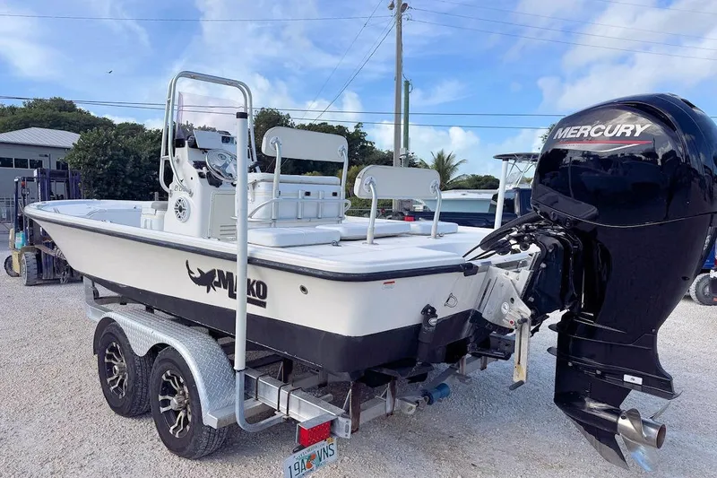 Slide: The Image of 2019 Mako 21 LTS boat with Mercury outboard engine on trailer. - 3