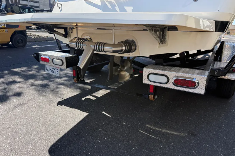 Slide: The Image of 2007 MasterCraft X-15 boat on trailer, showing propeller and exhaust system. - 11