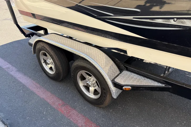 Slide: The Image of Trailer of 2007 MasterCraft X-15 boat with dual wheels and diamond plate fenders. - 9