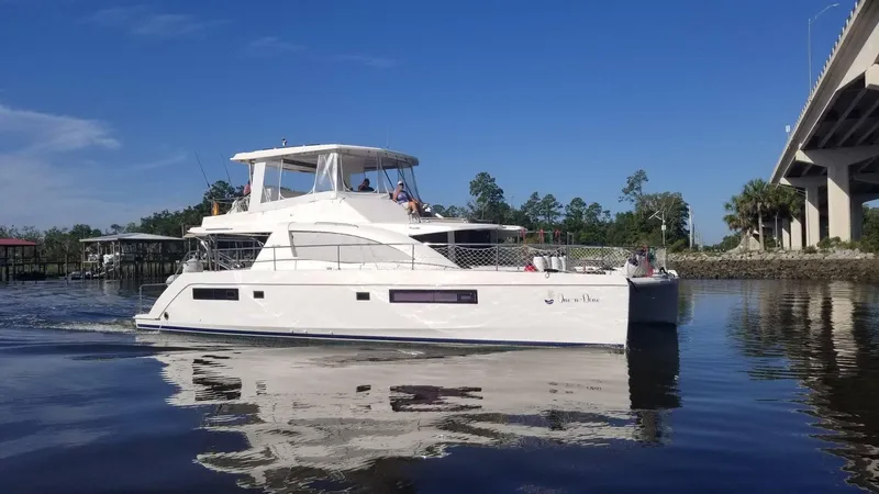 The Image of Leopard 51 Powercat 2016 on calm water under blue sky. - 0