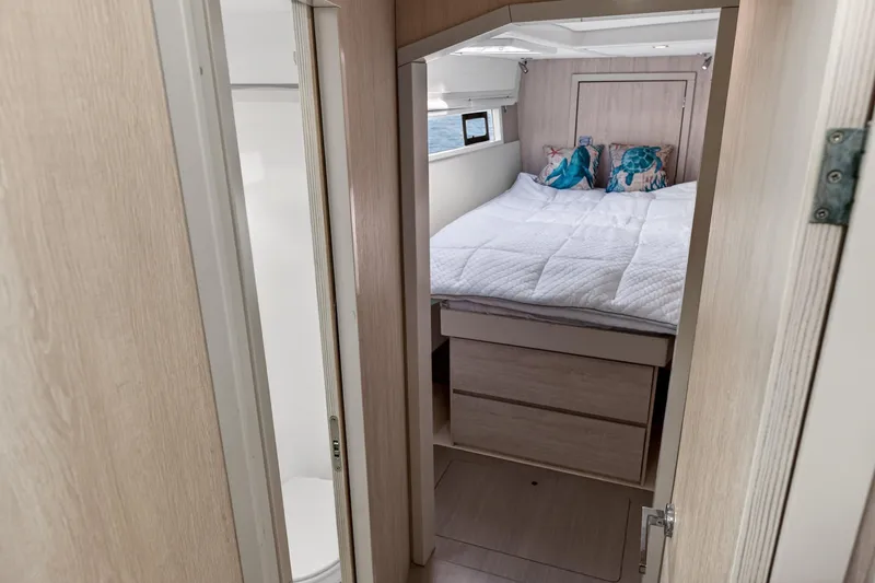 Slide: The Image of Cozy bedroom in 2016 Leopard 51 Powercat with nautical-themed decor. - 107