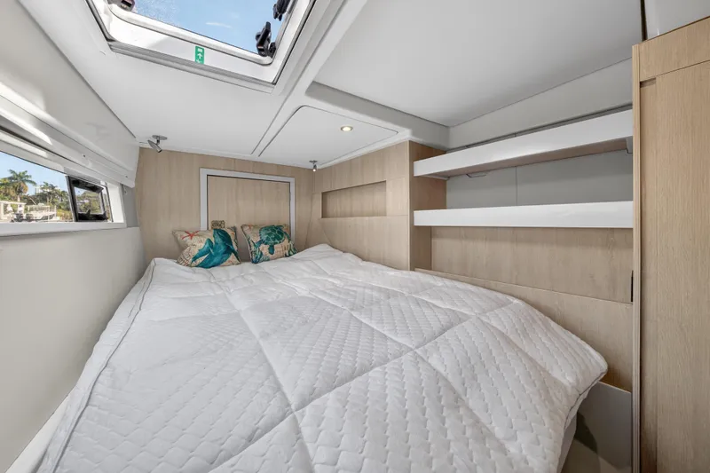 Slide: The Image of Cozy bedroom in 2016 Leopard 51 Powercat with skylight and modern decor. - 109