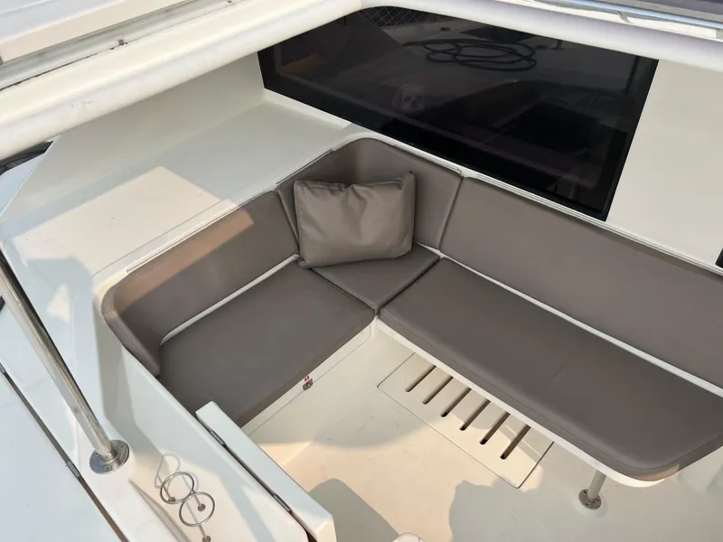 Slide: The Image of Spacious interior of 2016 Leopard 51 Powercat with modern seating and table. - 11