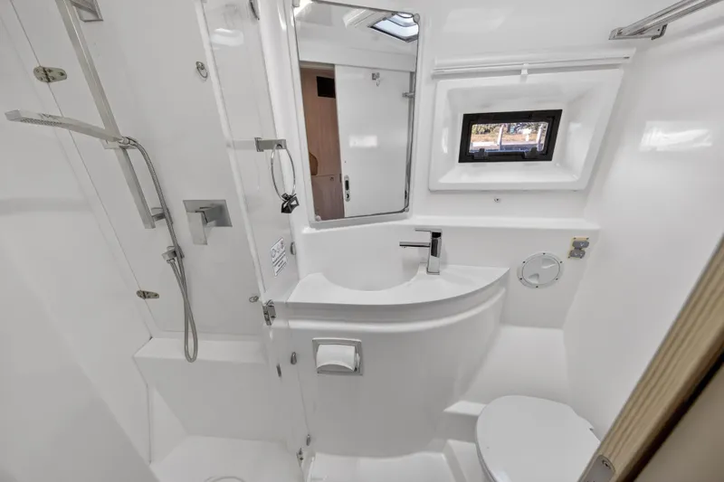 Slide: The Image of Bathroom interior of 2016 Leopard 51 Powercat, featuring modern fixtures and a compact design. - 111