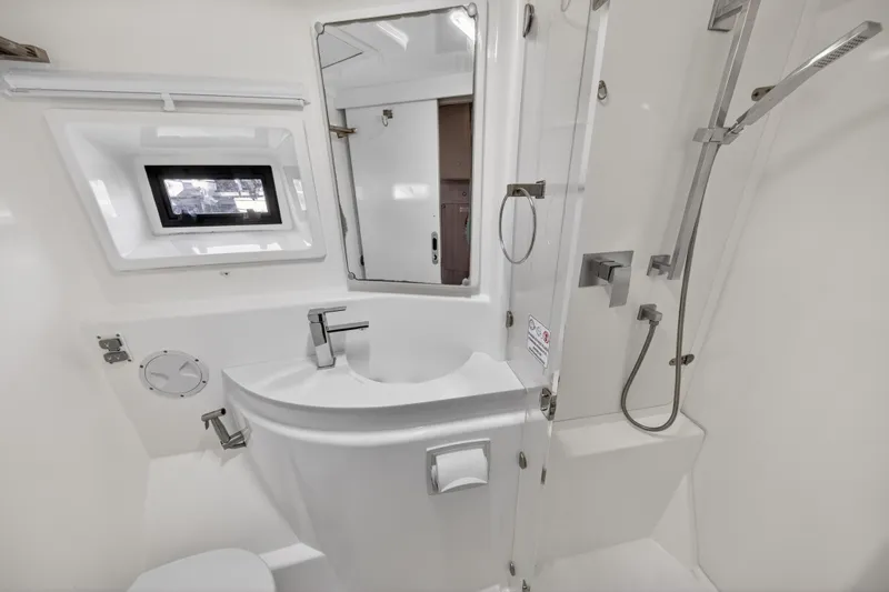 Slide: The Image of Modern bathroom in 2016 Leopard 51 Powercat yacht with sleek fixtures and shower. - 118