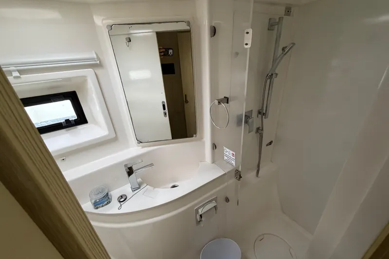 Slide: The Image of Bathroom interior of 2016 Leopard 51 Powercat yacht, featuring shower and sink. - 22