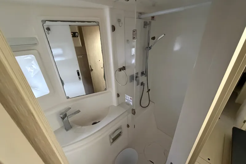 Slide: The Image of Bathroom interior of 2016 Leopard 51 Powercat yacht, featuring modern fixtures and shower. - 28
