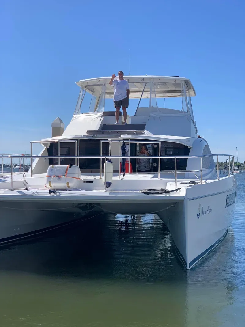 Slide: The Image of Leopard 51 Powercat 2016 on calm water with people aboard. - 3